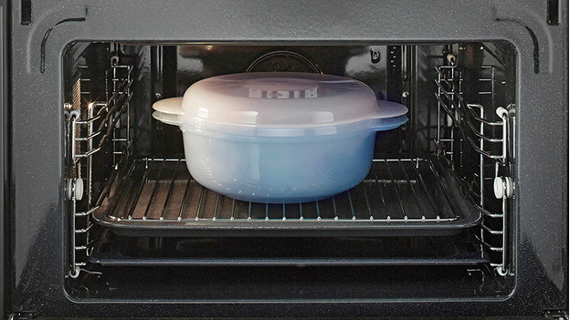 Oven with a container in it