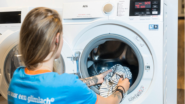 Washer dryer clothes on sale wet after drying