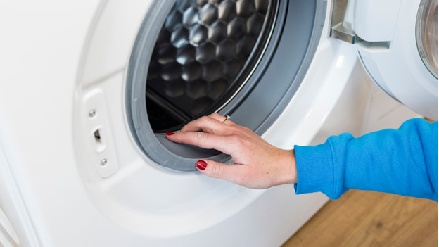 Remove lint from washer dryer combination