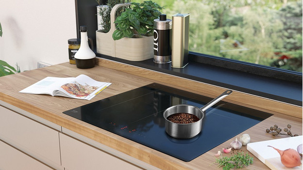 ETNA Performance cooktop with a pan of chocolate