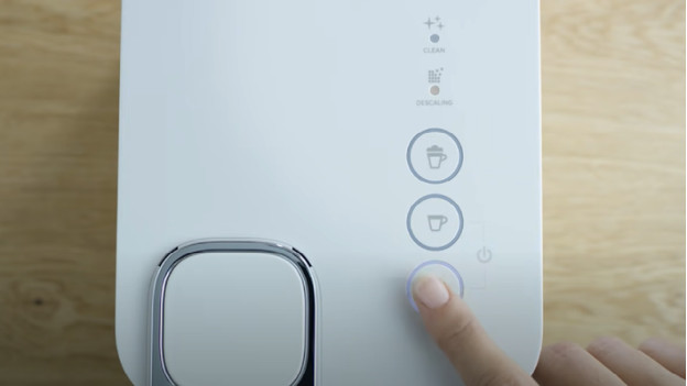 Appuyez sur le bouton pour préparer un expresso