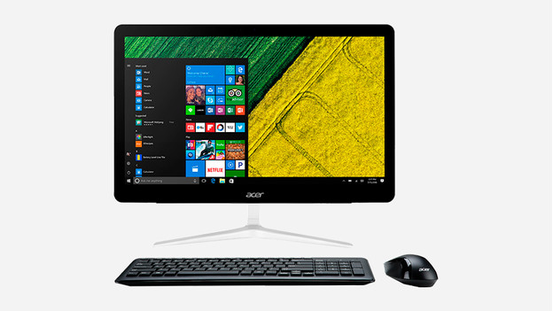PC tout-en-un avec clavier et souris.