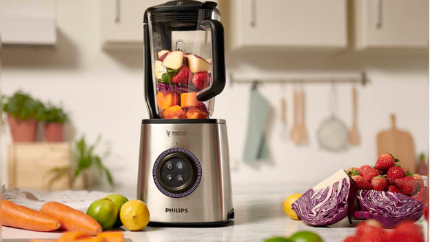 Blender with fruit and vegetables