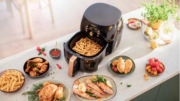 Airfryer with fries, meat, and fish