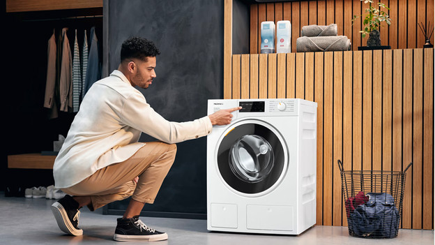 Turn on the Miele washing machine