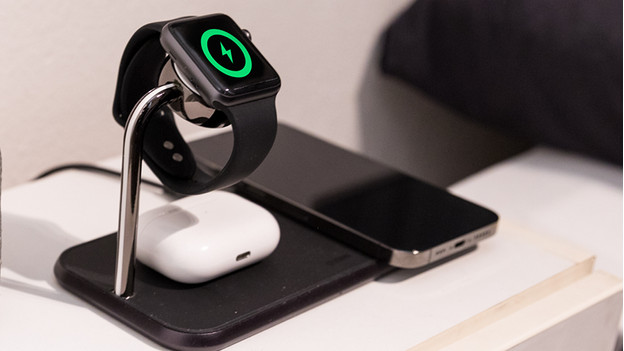 Wireless charging iPhone 15 with smartwatch and AirPods