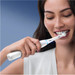 Oral-B iO Series 8n White with Extra Brush Attachment product in use