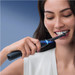 Oral-B iO 8n Black + iO Ultimate Clean Brush Attachments (4 units) product in use