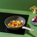 Tefal Renew ON C42719 Ceramic Wok 28cm product in use