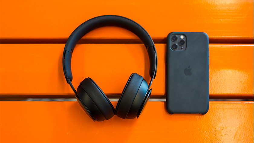 Beats Solo Pro next to iPhone