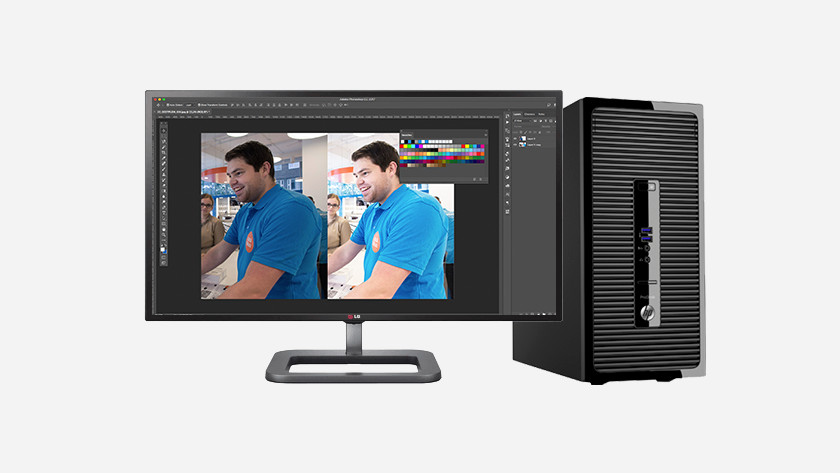 Ordinateur avec écran et Photoshop sur l'écran.