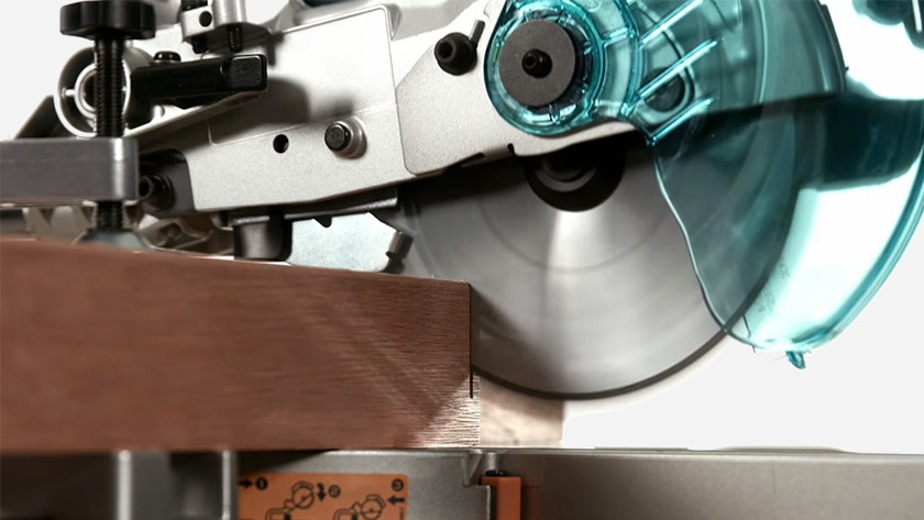 Makita LS1018LN cuts through a thick beam.