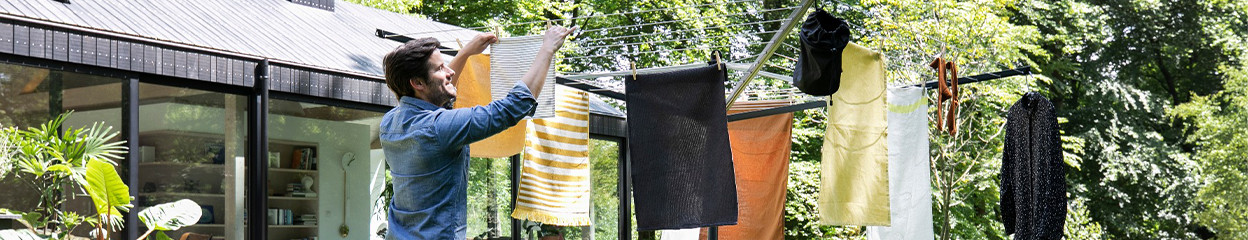 Comment placer l'ancrage au sol de votre séchoir parapluie ?