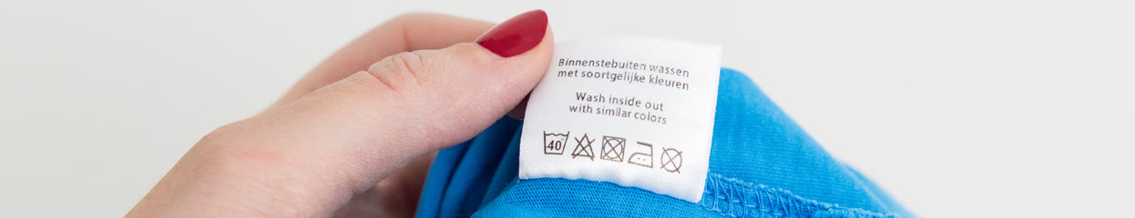 Wat betekenen de strijksymbolen op je kleding? 
