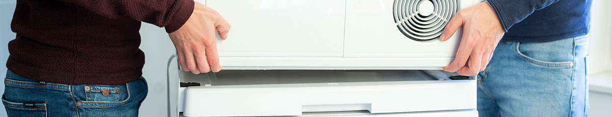 How do I stack my dryer on my washing machine?