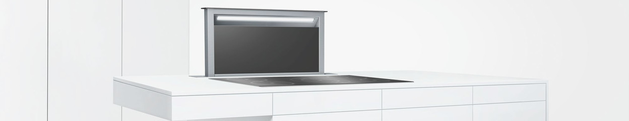 What are the advantages and disadvantages of a downdraft range hood?