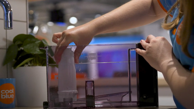 Put the water filter back in the water tank