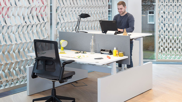 Sit-stand desk for ergonomics