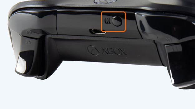 Bouton de synchronisation manette