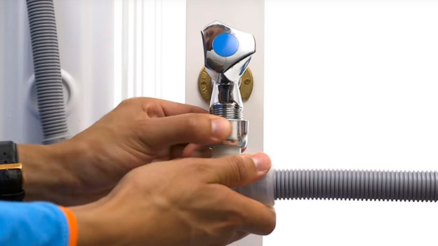 Disconnect the inlet hose of the washing machine