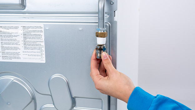 Place a gas connector on a stove