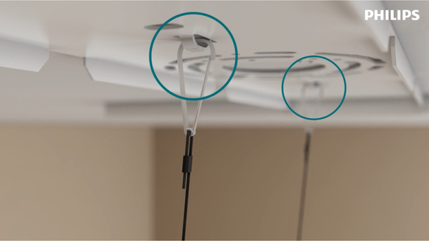 Step 2: secure the safety cable to the lamp and mount