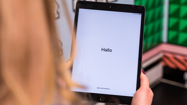 The home screen of a reset iPad.