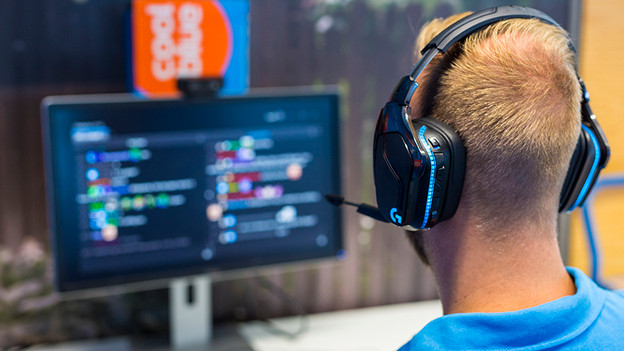 Someone with a headset with built-in microphone