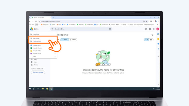 Open Google Drive on your old laptop.