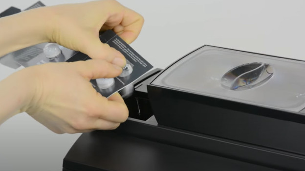 Place the tablet and rinse the machine