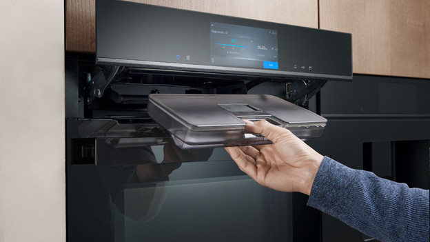 Four à vapeur avec filtre à eau