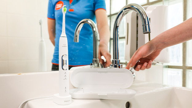 Put the brush attachment on Philips Sonicare