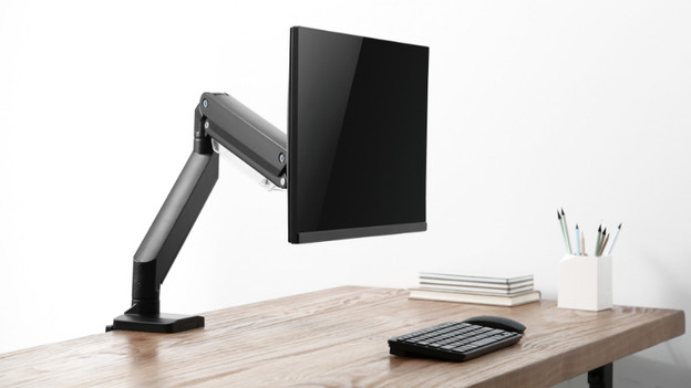 Un bras d'écran PC Neomounts avec ressort à gaz