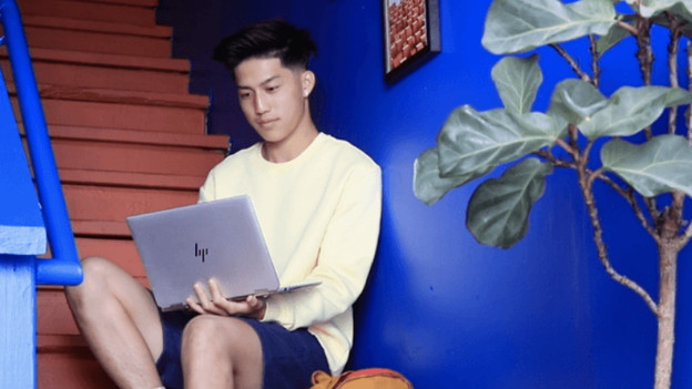 Man with thin laptop