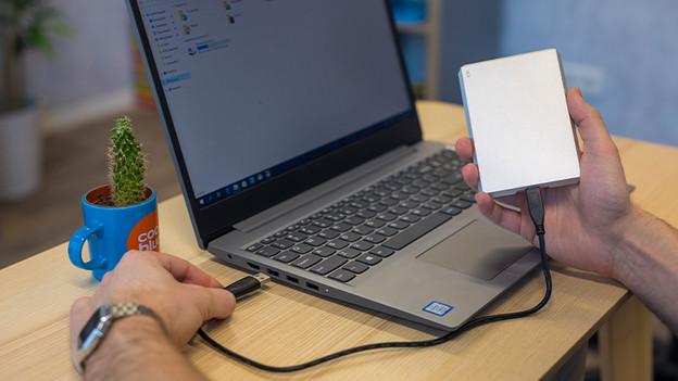 Laptop with external storage.