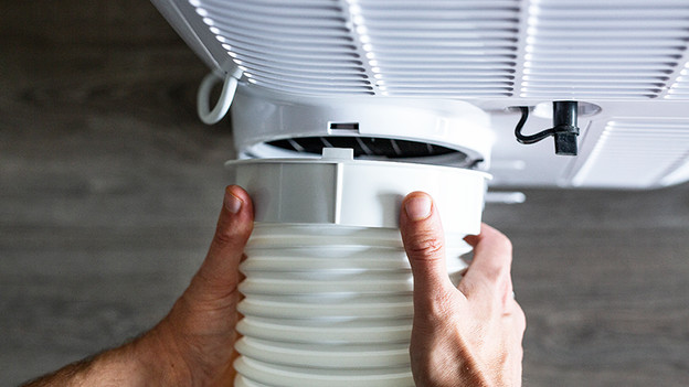 Placez le tuyau d'évacuation le plus droit possible