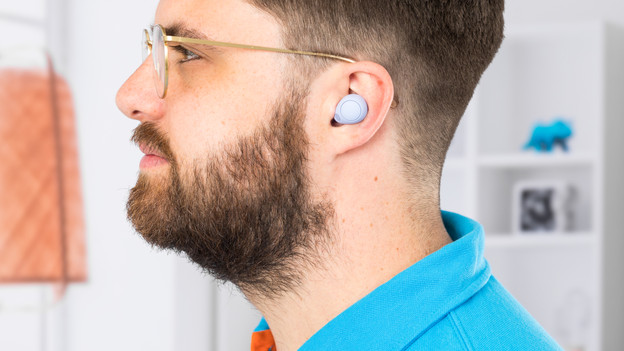 How do you put in your earbuds?