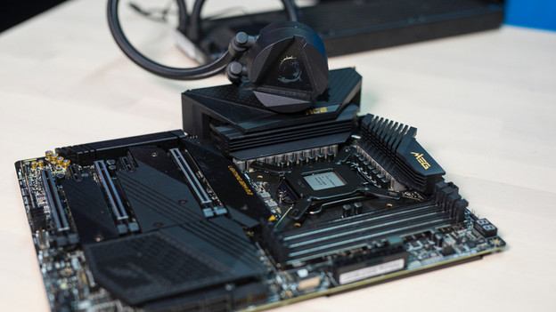 A processor cooler with water pump is ready to be installed on the processor