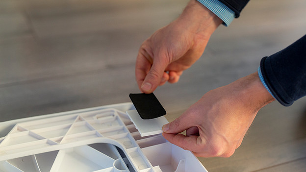 Then stick a black anti-slip strip on each white strip.