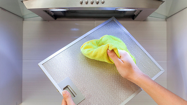 Clean the grease filter range hood