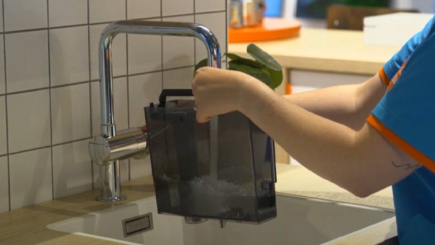 Fill the water tank to 'max'