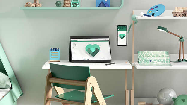 Laptop and phone with Microsoft 365.