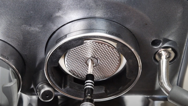 Retirer le joint de groupe usagé de la machine