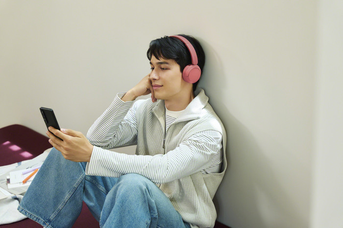 Sony WH-CH535 Red product in use