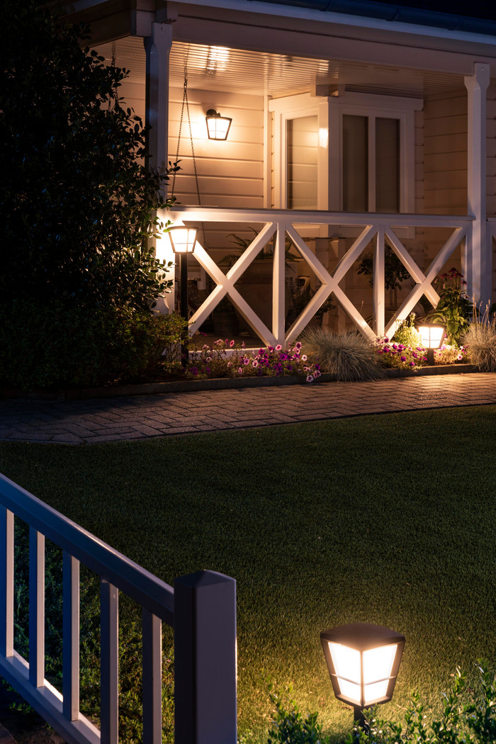 Philips Hue Econic Wall Lamp White and Color Black Hanging product in use