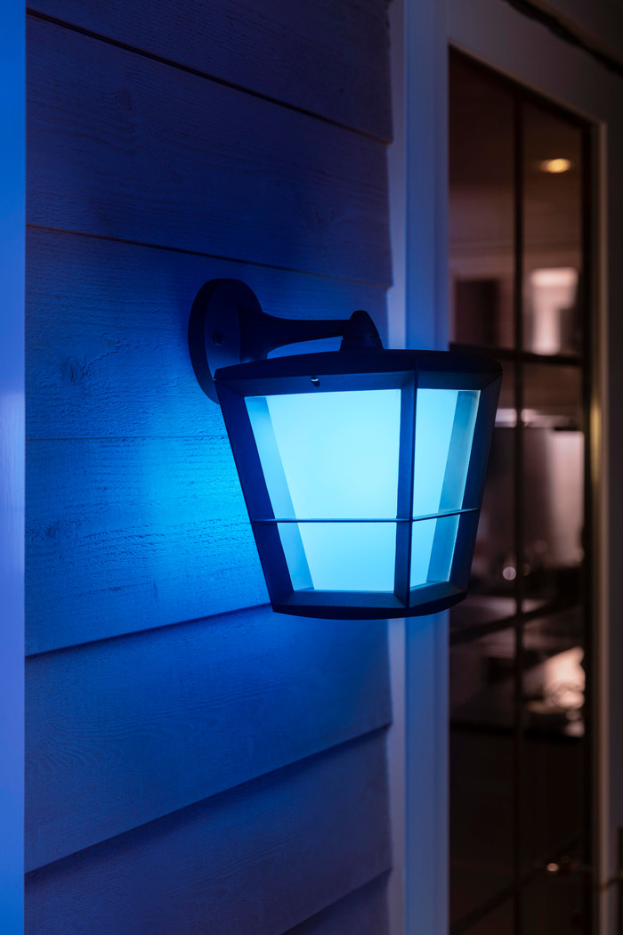 Philips Hue Econic Wall Lamp White and Color Black Hanging product in use