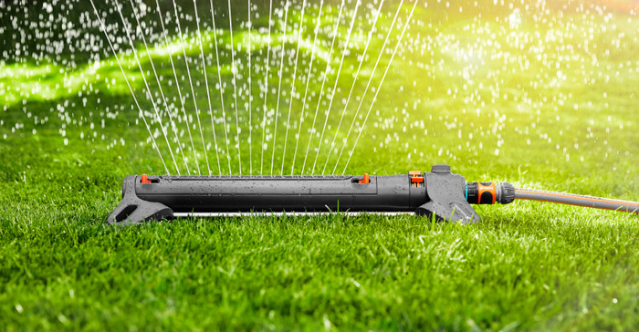 Gardena Comfort FLEX 50m Large Sproeierpakket product in gebruik