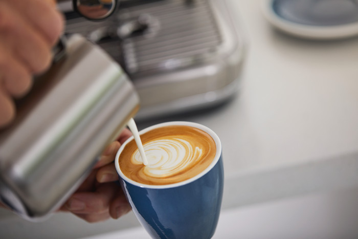 Sage Barista Express Stainless Steel product in use