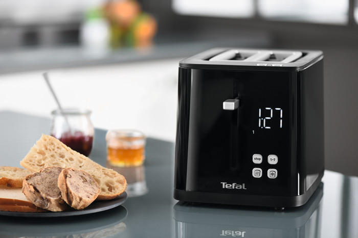 Tefal Smart & Light TT6408 Toaster product in use