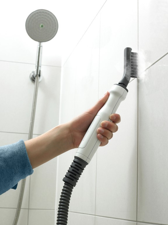 BLACK+DECKER 13-in-1 Steam-mop met SteaMitt product in gebruik